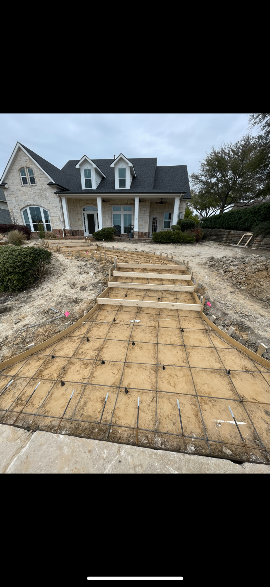 Concrete walkway forms and rebar ready for pour
